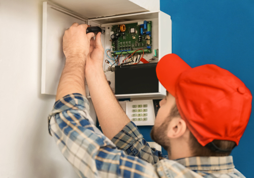 Electrician Installs Alarm System - finding emergency electricians