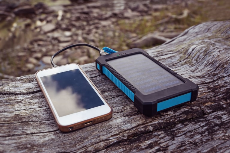 Solar Powered Charger Charging a Phone